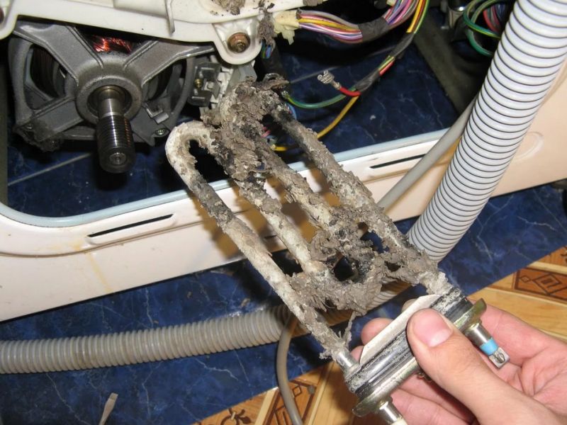 Испорченный тэн стиральной машины Samsung